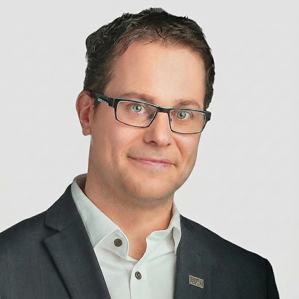 Portrait de Jean-Robert Lehoux, en veston et lunettes